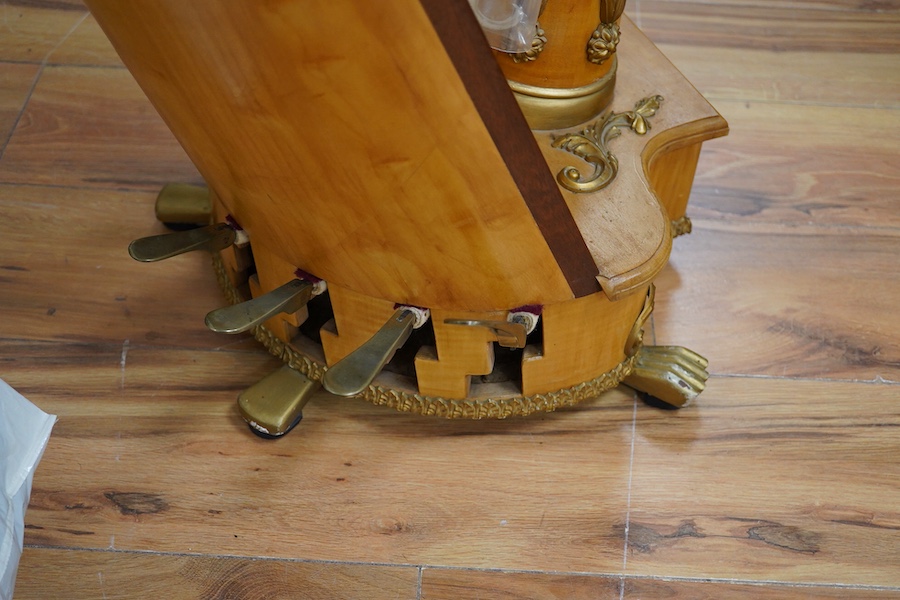 A Grecian satinwood seven pedal harp by J.C. Schwieso & Co., 19 Great Marlborough Street, Regent Street, London, numbered ‘824’, with brass makers plate and decorated with gilt mouldings, 173cm high